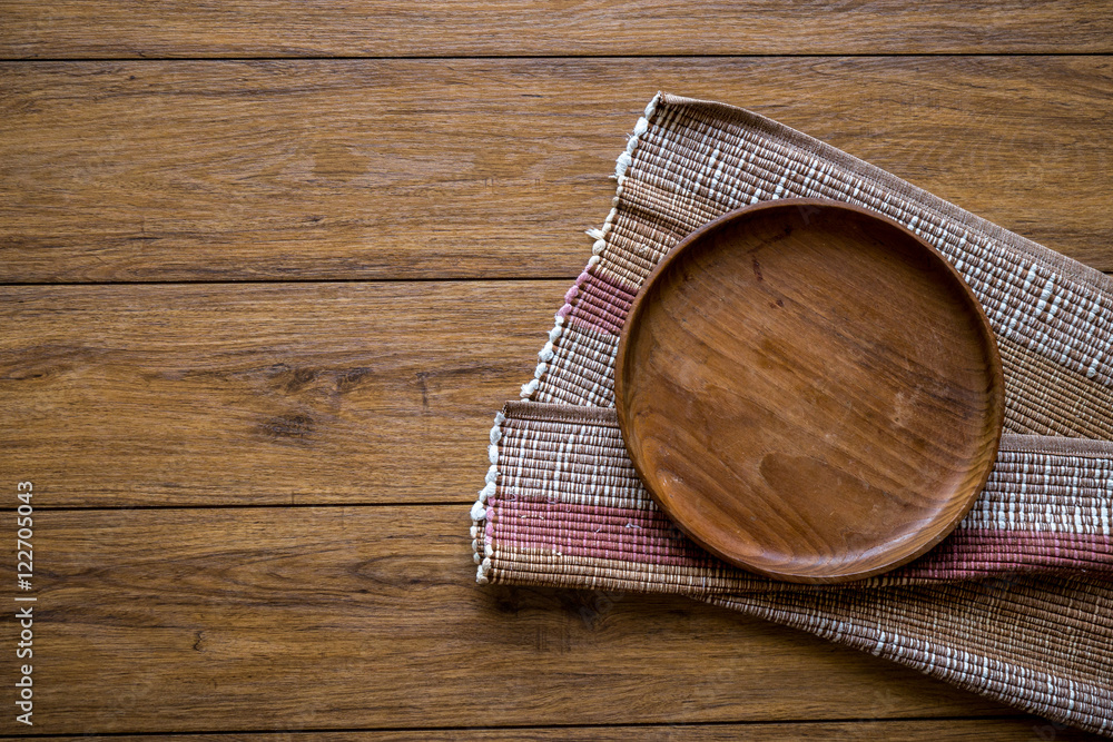 old wooden table with empty plate on a wooden table and copyspac old wooden table with empty plate on a wooden table and copyspac