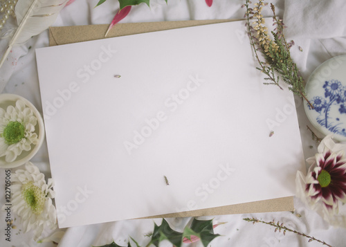 Blank white card with flowers