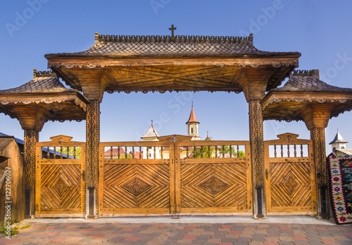 Traditional gates in gura humorului monastery bucovina, moldavia photo