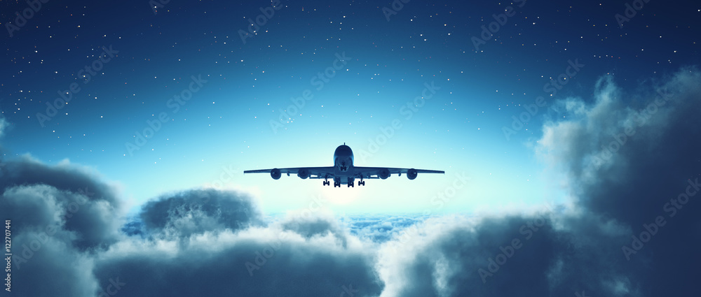Naklejka premium Airplane flying over cloudy sky.