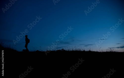 woman travelling in nature with backpack