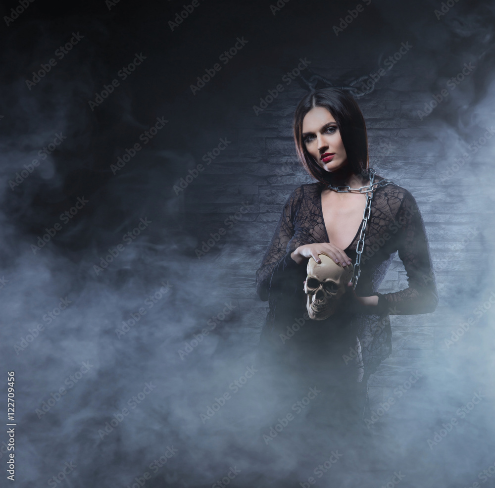 Halloween concept: young and sexy witch Halloween concept: young and sexy witch