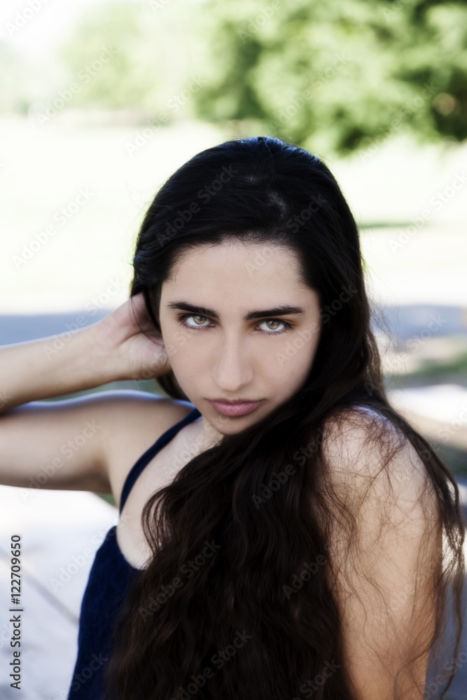 Outdoor Portrait In Park Dark Hair Woman Outdoor Portrait In Park Dark Hair Woman