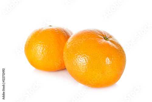 whole ripe orange on white background