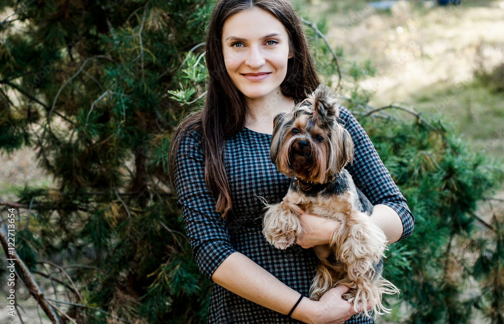Young woman with yorkshire terrier Young woman with yorkshire terrier