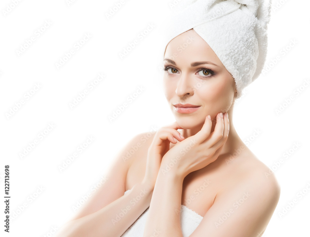 Young, beautiful woman wrapped in a towel Young, beautiful woman wrapped in a towel