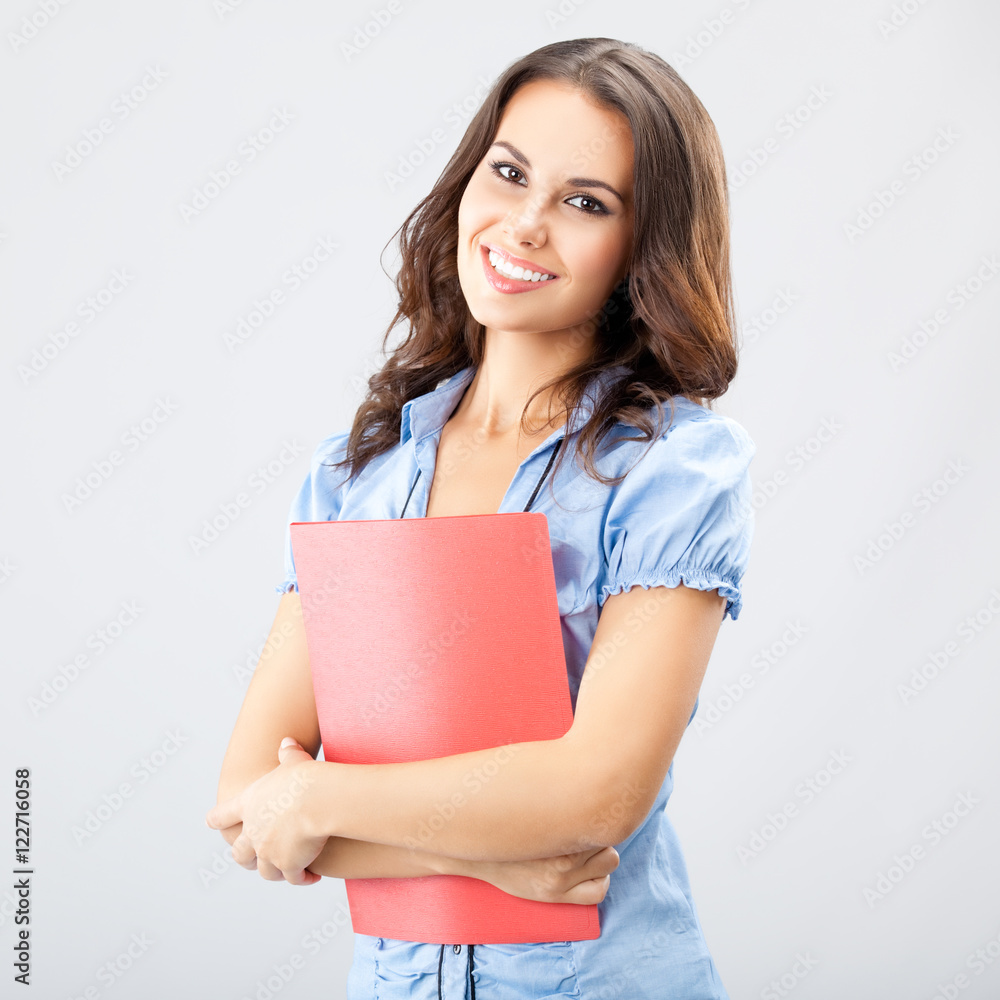 Businesswoman with red folder Businesswoman with red folder