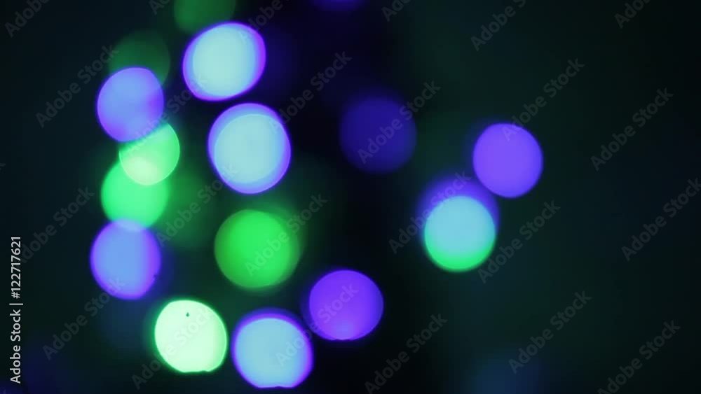Flashing colored lights. Holiday and Party, Abstract Design Elements, Night City is Defocused With Nice Bokeh Flashing colored lights. Holiday and Party, Abstract Design Elements, Night City is Defocused With Nice Bokeh