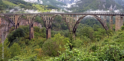 Dzhurdzhewich bridge in the mountains of Montenegro photo