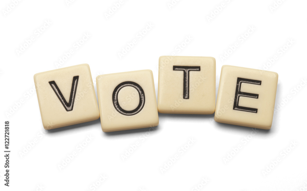 Vote spelled out with lettered tiles on white background. Clipping path included. Vote spelled out with lettered tiles on white background. Clipping path included.