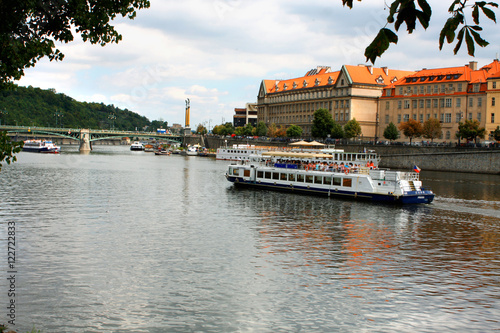 Prague, Czech Republic with turist boat and Vltava river