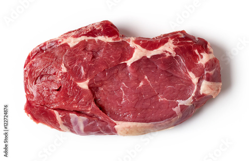 Fresh raw beef steak isolated on white, from above