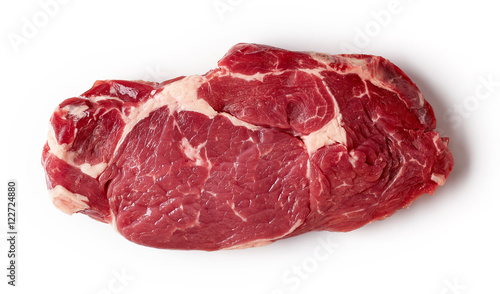 Fresh raw beef steak isolated on white, from above