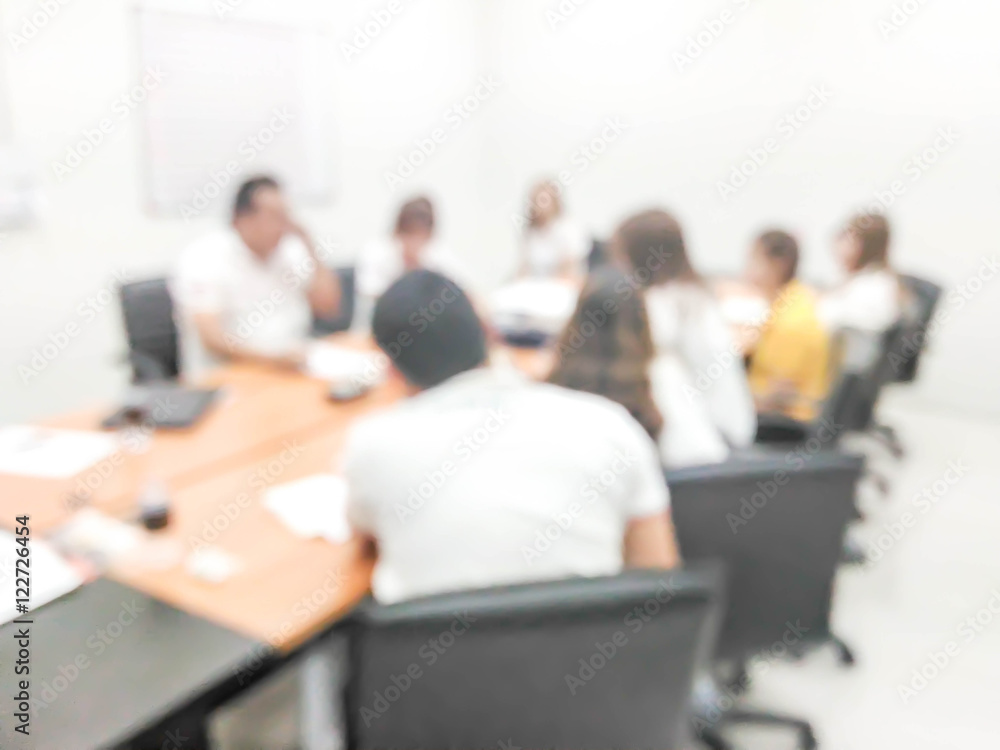 blurred people in the meeting room blurred people in the meeting room
