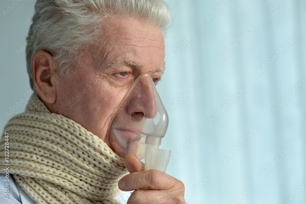 elderly man with flu inhalation elderly man with flu inhalation