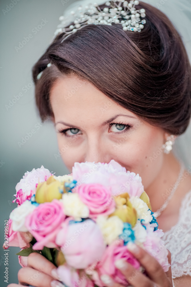 Wedding. Beautiful bride with bouquet. Woman close up with flowers. Wedding. Beautiful bride with bouquet. Woman close up with flowers.