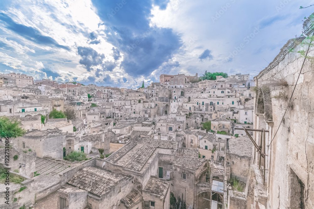 typical view of stones (Sassi di Matera)  of Matera under blue sky. Matera in Italy