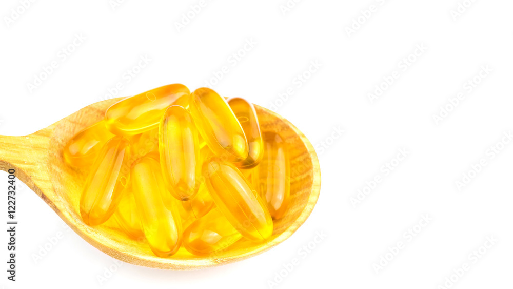 Full spoon of fatty acid, omega 3 capsules isolated on white background. Full spoon of fatty acid, omega 3 capsules isolated on white background.