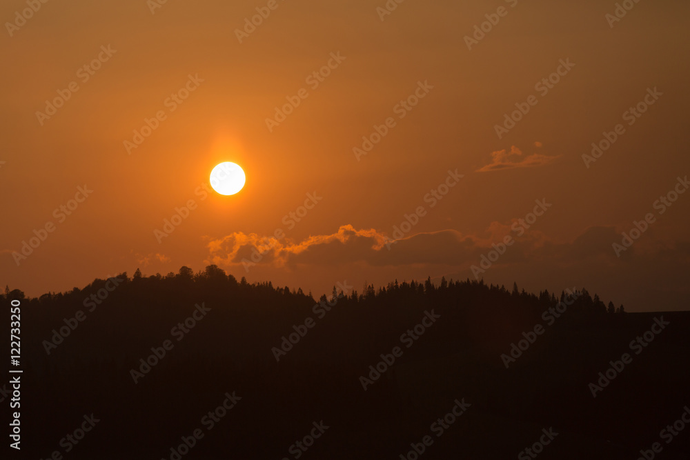 Fototapeta premium Mountain range on the background of the sunset