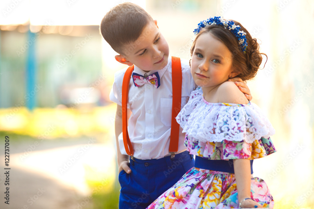 Boy and girl holding hands. Valentine's Day. Love story