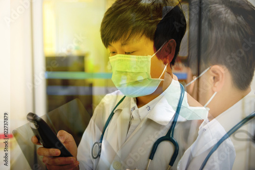 asia scientist working in biological laboratory.