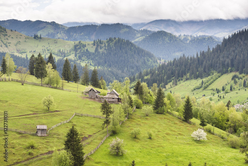Hilly rural landscape of the Bukovina Region at Sadova, Romania photo