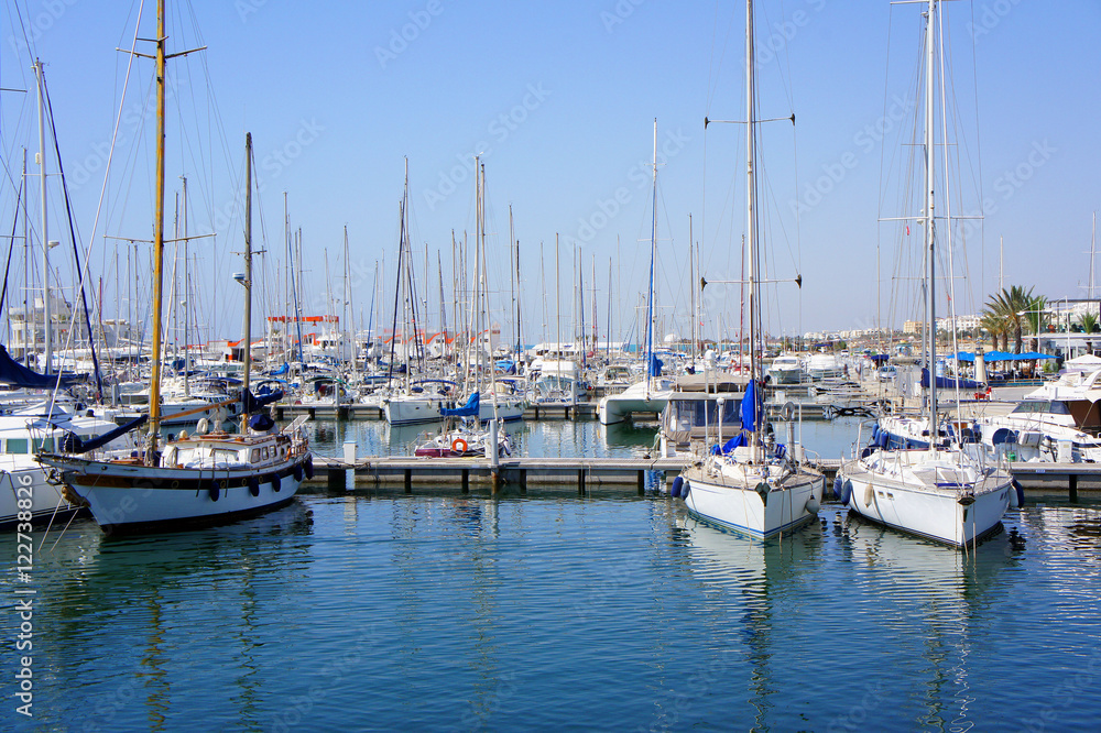 Sailboats moored in the harbor