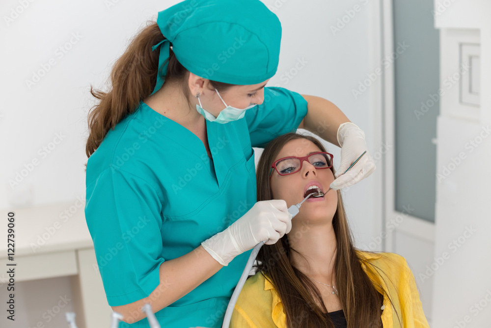 Young woman patient at the dentist Young woman patient at the dentist