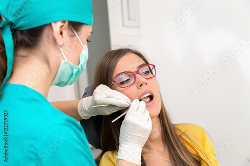 Young woman patient at the dentist