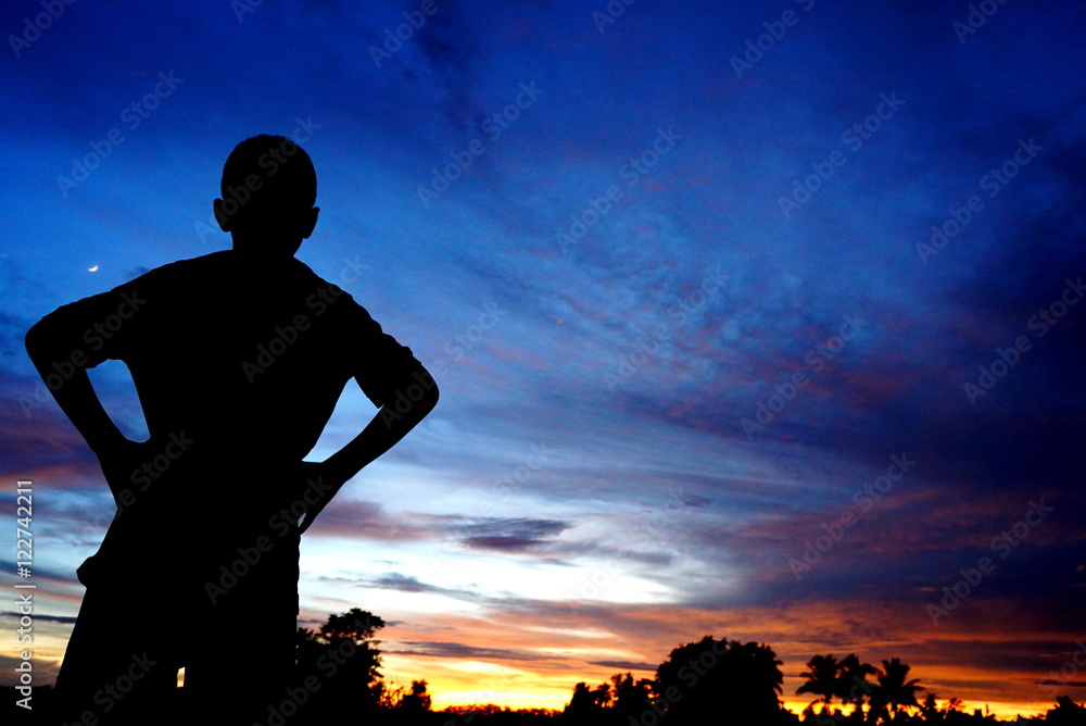 silhouette of boy watching at sunset, happy enjoying moment, success concept, silhouette of boy watching at sunset, happy enjoying moment, success concept,