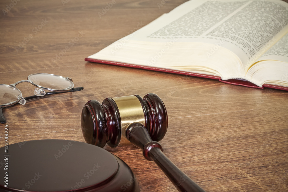 Judge gavel and old books