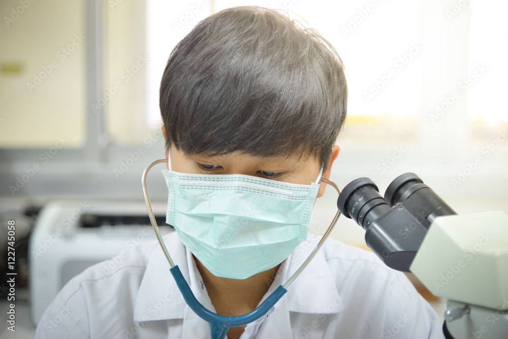 asia scientist working in biological laboratory. asia scientist working in biological laboratory.