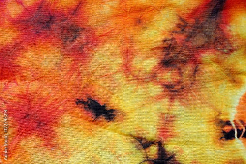 Obraz na płótnie colorful orange tie dye fabric pattern texture for background