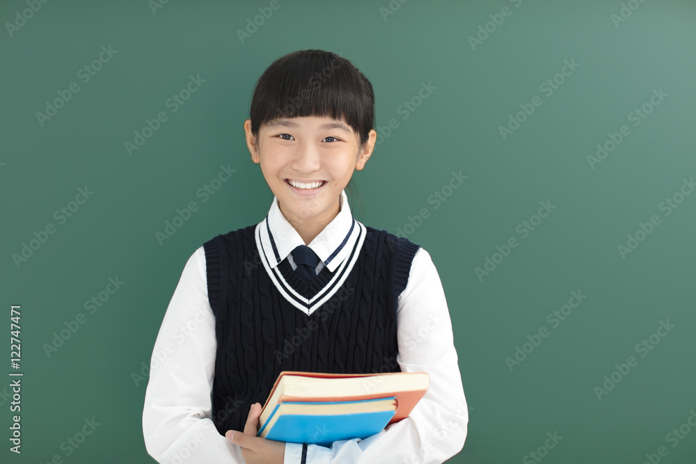 smiling teenager Student girl stand before chalkboard smiling teenager Student girl stand before chalkboard