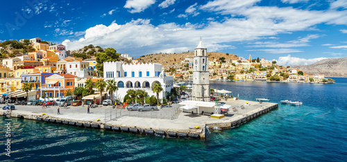 Panorama of beautiful summers day on the Greek island  Symi in the Dodecanese Greece Europe photo