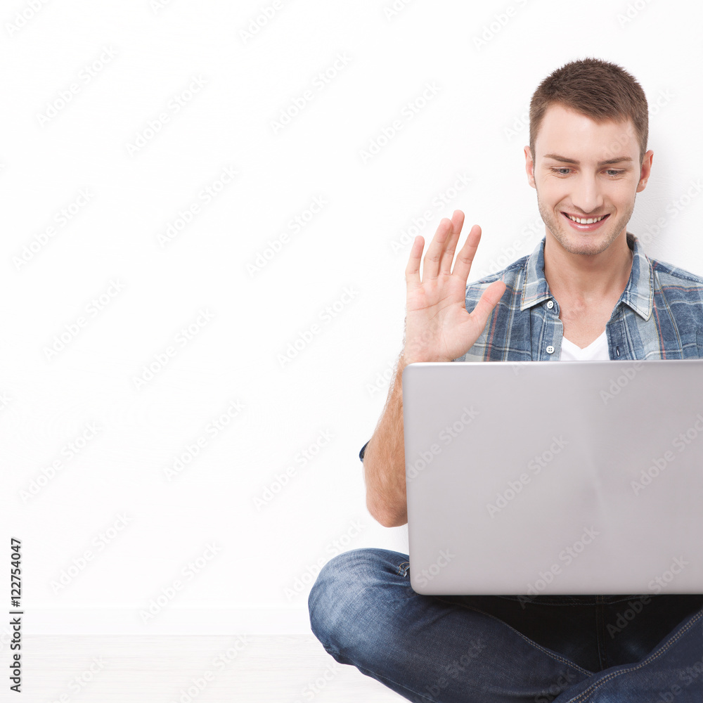 Young couple talking to each other via online video chat. Young couple talking to each other via online video chat.