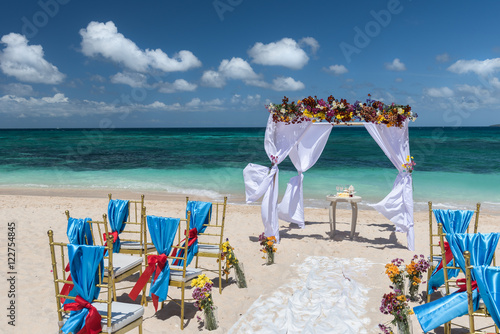 decorated wedding arch on Puka beach at Boracay island Philippin photo