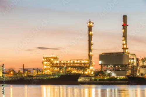 Oil refinery plant at dusk.