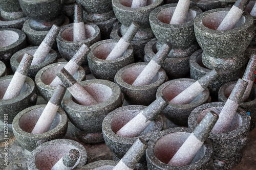 A lot of mortar and pestle sell in the Angsila market at Chonburi Province, Thailand. photo