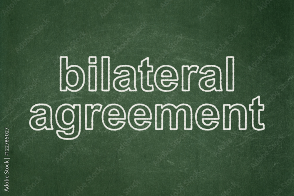 Fototapeta premium Insurance concept: Bilateral Agreement on chalkboard background