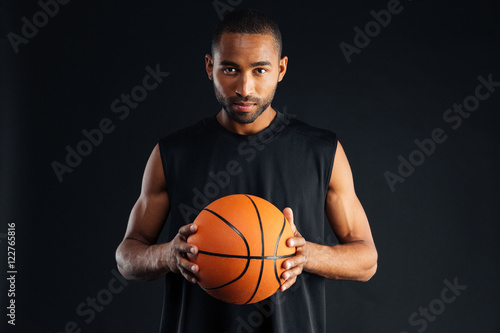 Portrait of a serious confident basketball player