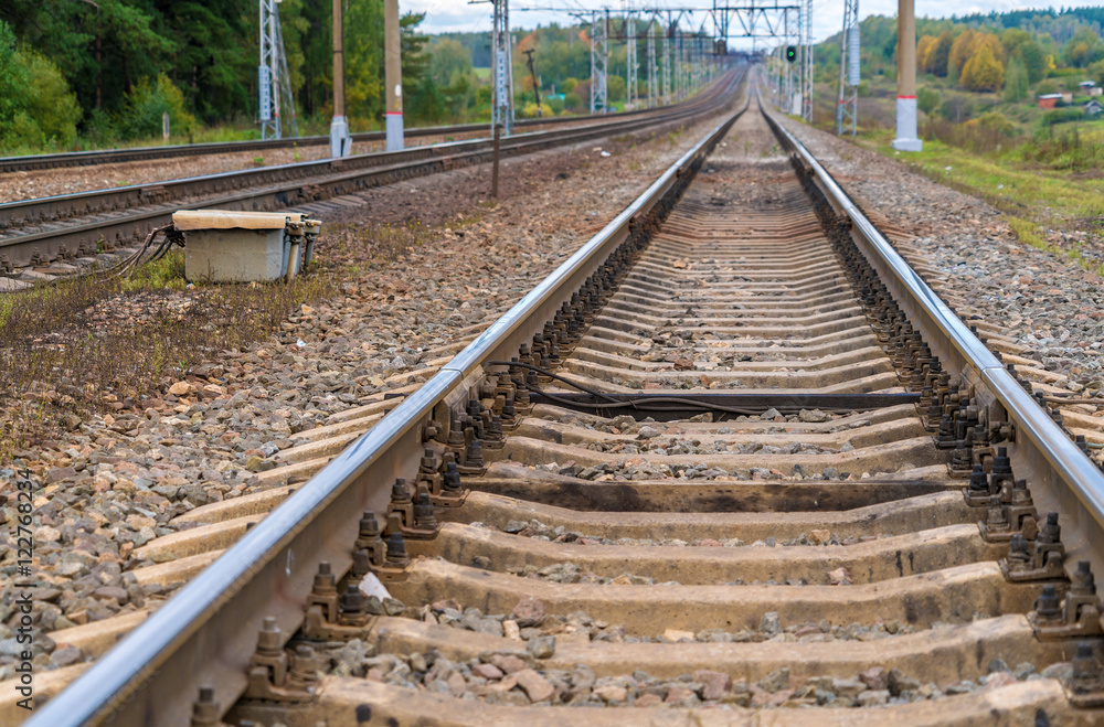 Railroad tracks stretching into the distance Railroad tracks stretching into the distance