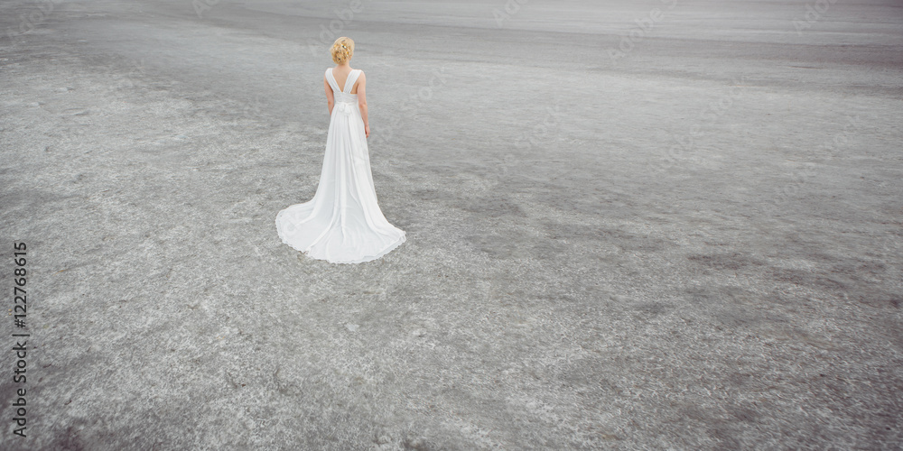 Beautiful bride outdoors in a desert. Beautiful bride outdoors in a desert.