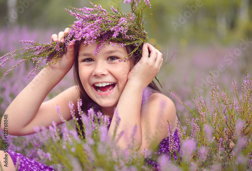 Girl in heather flowers