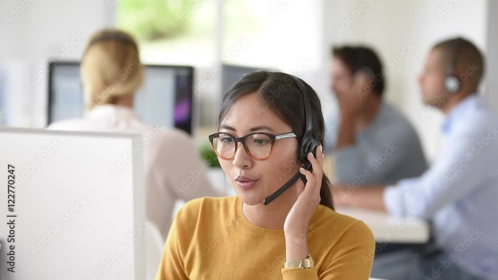 Customer service assistant working in office