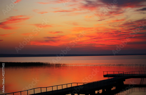 the beautiful colorful sunset on the lake © zhannaz