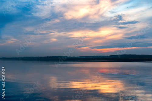 summer sunset on the shore of a  lake © EvgenyPyatkov