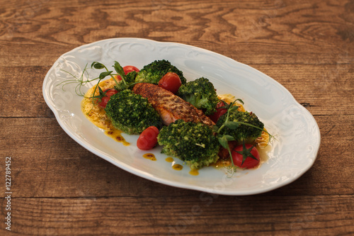 Grilled fish fillet with BBQ vegetables and sauce