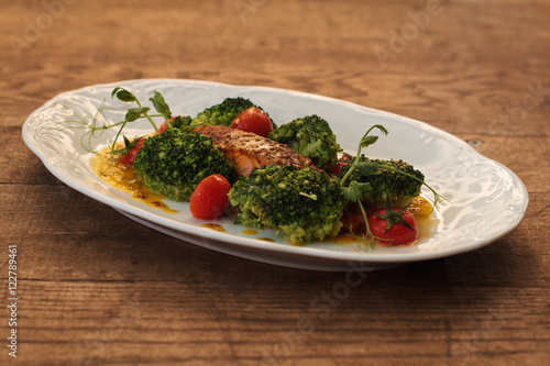 Grilled fish fillet with BBQ vegetables and sauce