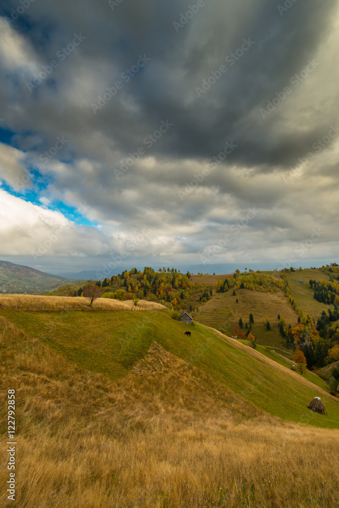 Fototapeta premium Idyllic autumn scenery in remote mountain area in Transylvania